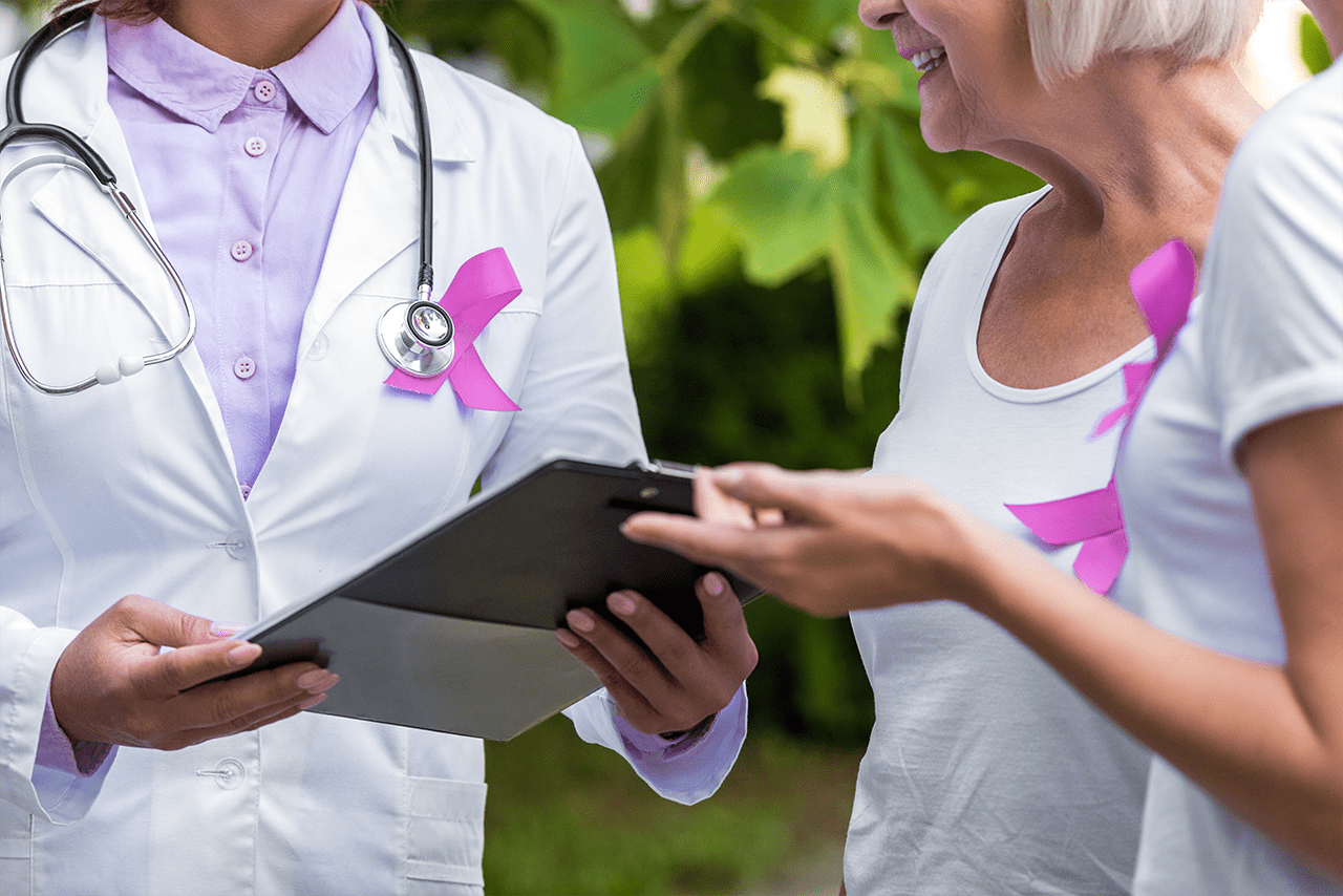 cropped-shot-of-women-with-pink-ribbons-and-doctor-2024-11-17-23-30-50-utc